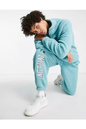 ASOS ASOS Actual - Joggers comodi azzurri in pile borg con logo ricamato in coordinato