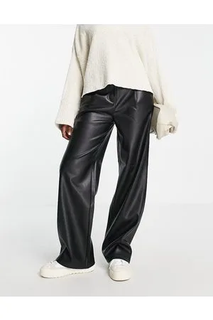 River Island Pantaloni a fondo ampio neri in pelle sintetica