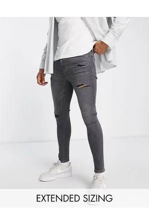 ASOS Jeans spray-on super elasticizzati nero slavato con strappi sulle cosce