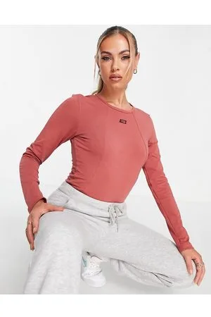Nike Icon Clash - Body color ruggine con logo a stemma