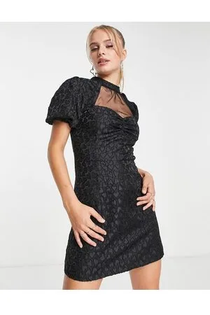 Miss Selfridge . Vestito corto con inserto a rete e cuori dévoré