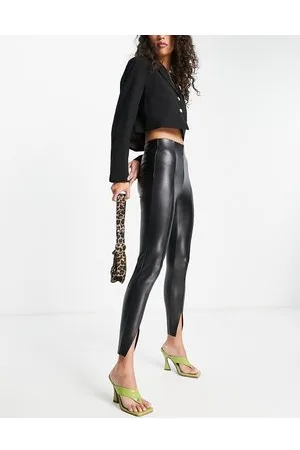 Topshop Pantaloni skinny in pelle sintetica neri con spacchi sul davanti
