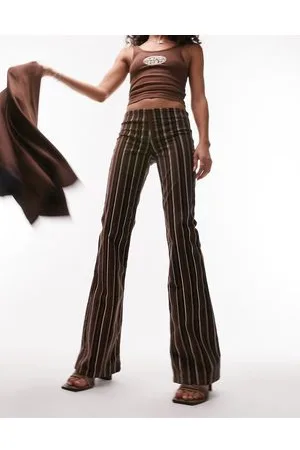 Topshop Pantaloni a zampa a vita bassa in velluto a coste cioccolato a righe