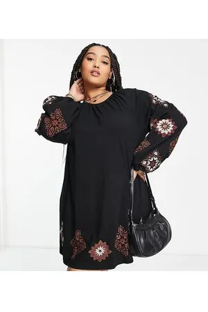 ASOS ASOS DESIGN Curve - Vestito grembiule corto a maniche lunghe con ricamo a punto croce