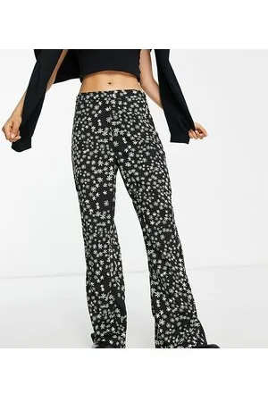 Pieces® Esclusiva - Pantaloni a zampa a neri e verdi a fiori