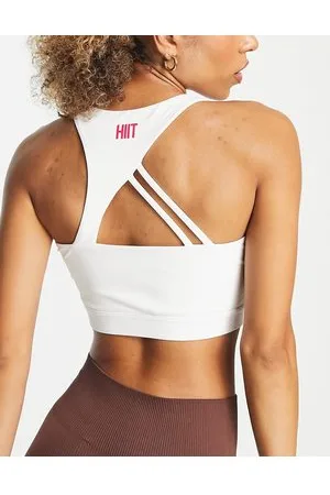 HIIT Top senza maniche asimmetrico con scollo a vogatore