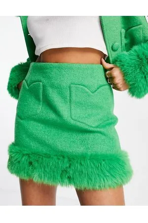 Miss Selfridge Minigonna con finiture in pelliccia sintetica e tasche a cuore in coordinato
