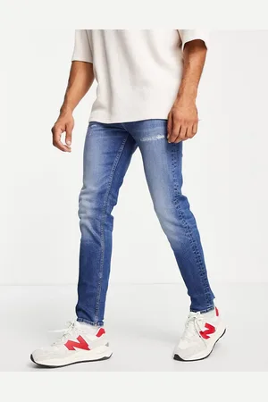 ASOS Jeans skinny lavaggio scuro con fondo invecchiato