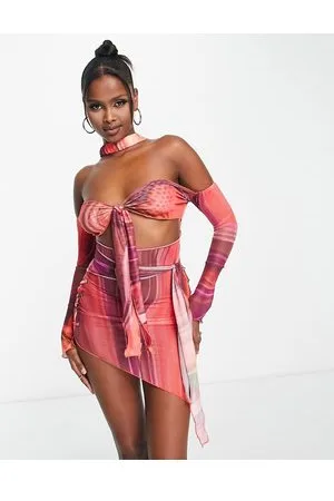 BAD SOCIETY CLUB Vestito aderente in rete rossa con cut-out e allacciatura frontale in coordinato