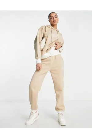 adidas Mountain Explorer - Joggers beige con fondo elasticizzato a contrasto