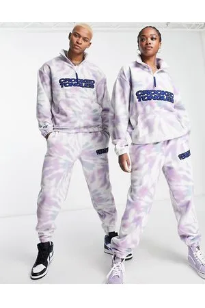 Crooked Tongues Joggers comodi unisex in pile lilla con motivo tie-dye e logo ricamato in coordinato