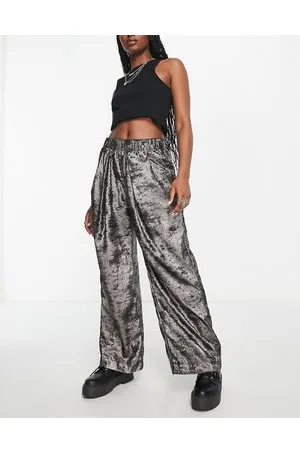 Free People Pantaloni a fondo ampio grigio canna di fucile metallizzato