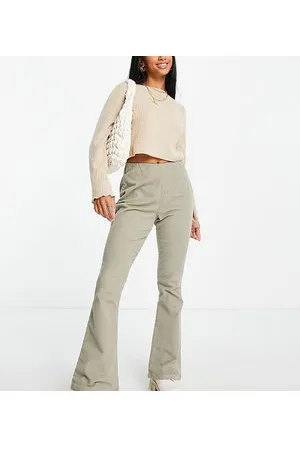ASOS ASOS DESIGN Petite - Pantaloni a zampa in velluto a coste salvia