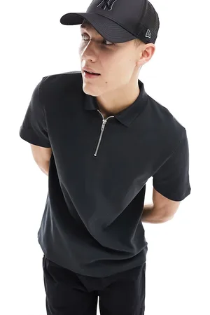ASOS Polo nera in tessuto lavorato a nido d