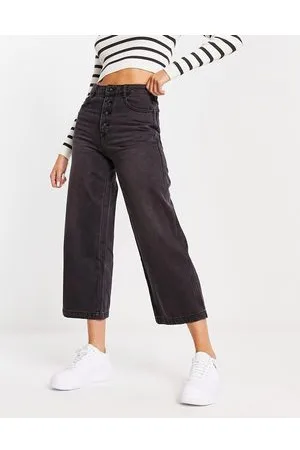 Pimkie Jeans a fondo ampio e vita alta neri con bottoni a vista