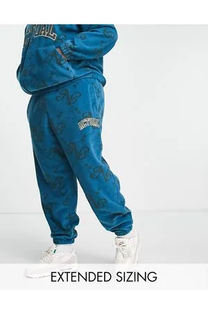 ASOS ASOS Actual - Joggers comodi in pile polar con stampa e logo applicato in coordinato