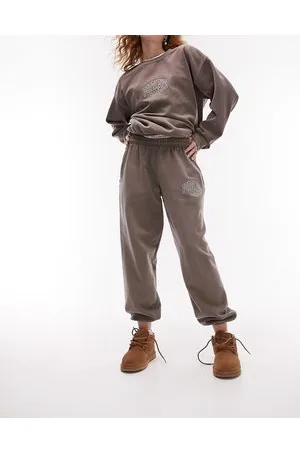 Topshop Joggers oversize cioccolato lavaggio vintage con ricamo "Portland" e fondo elasticizzato in coordinato