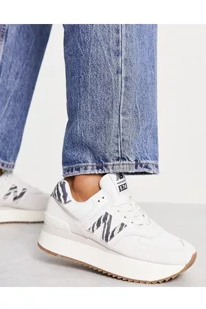 New Balance 574+ - Sneakers sporco con dettaglio zebrato