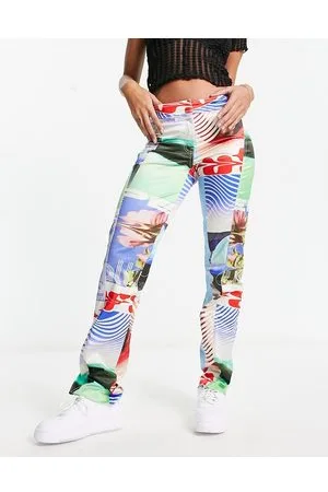 Weekday Lily - Pantaloni in raso con stampa multicolore stile motocross in coordinato