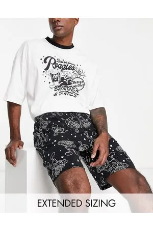 ASOS Completo pigiama con T-shirt e pantaloncini e bianco con stampa burger
