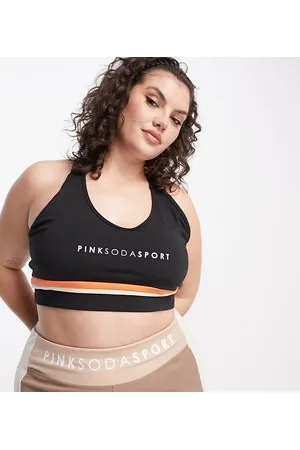 Pink Soda Plus - Reggiseno sportivo a sostegno medio con incrocio sul retro