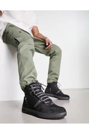 Lacoste Stivali medi invernali neri con clip a T
