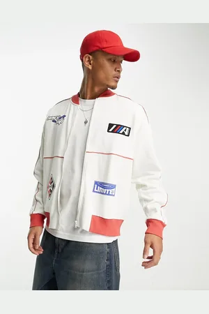 ASOS Giacca sportiva oversize in jersey sporco con stemmi sportivi