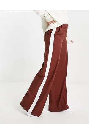 Weekday Callie - Pantaloni a fondo ampio color ruggine