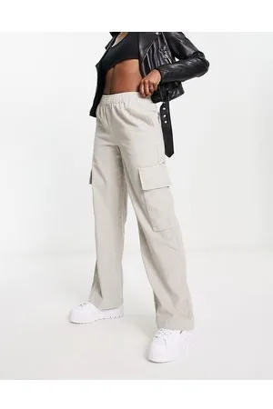 ASOS Pantaloni a fondo ampio in velluto a coste color pietra con tasche applicate