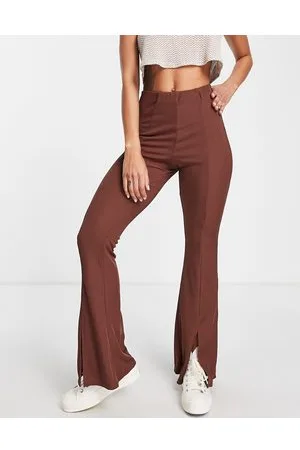 New Look Pantaloni a zampa marroni a coste con spacco sul davanti