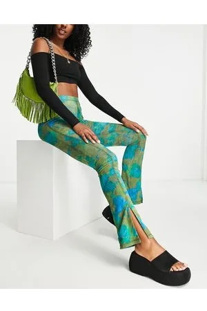 Topshop Pantaloni skinny in rete a fiori con cuciture a vista e spacchi sul fondo