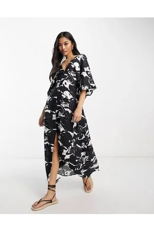 Monki Vestito caftano lungo nero e bianco mélange con allacciatura in vita