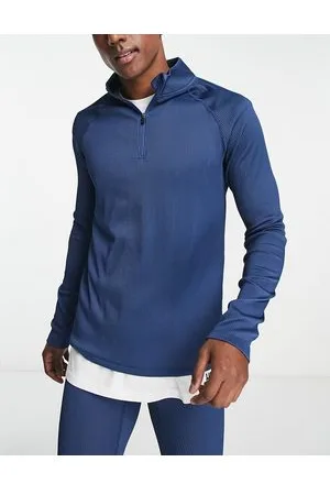 HIIT Top a maniche lunghe a coste con zip corta