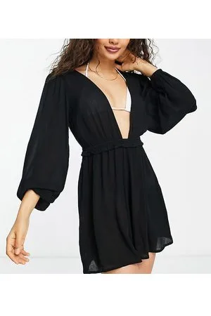ASOS ASOS DESIGN Petite - Tuta corta da mare nera con scollo profondo e maniche voluminose