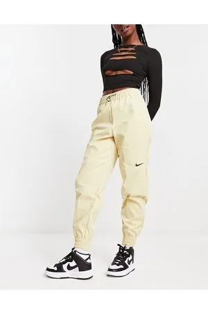 Nike Pantaloni cargo beige con logo
