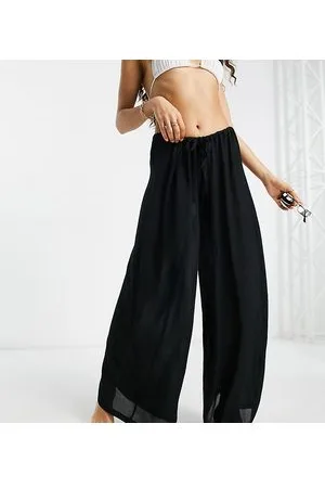 ASOS ASOS DESIGN Petite - Pantaloni palazzo da mare neri con coulisse