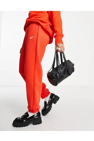 Nike Joggers oversize rossi con logo piccolo