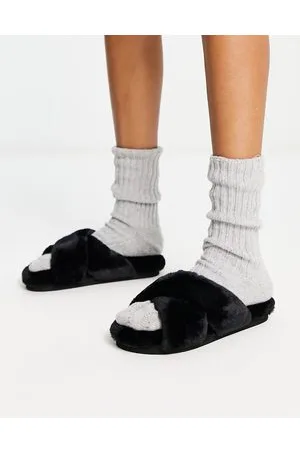 Monki Pantofole sliders incrociate nere in pelliccia sintetica
