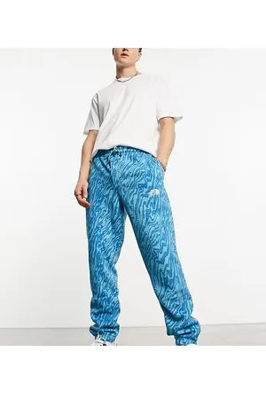 The North Face In esclusiva per ASOS - - Essential - Joggers oversize con stampa effetto marmo