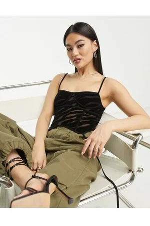Fashionkilla Top a corsetto in rete nera zebrata
