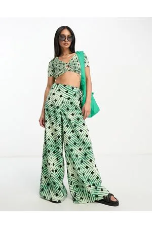 River Island Pantaloni da spiaggia con stampa geometrica chiaro in coordinato