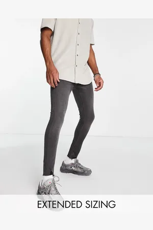 ASOS Jeans spray on power stretch slavato con strappi sul fondo