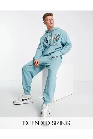 ASOS ASOS Actual - Joggers comodi azzurri con stampa con logo in coordinato