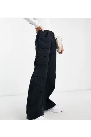 ASOS ASOS DESIGN Petite - Pantaloni cargo oversize multitasche neri