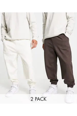 ASOS Confezione da 2 joggers oversize marrone scuro/bianco tenue