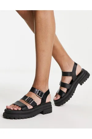 Schuh Tyla - Sandali neri in pelle con suola spessa