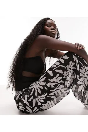 Topshop Pantaloni in chiffon con stampa astratta floreale monocromatica in coordinato