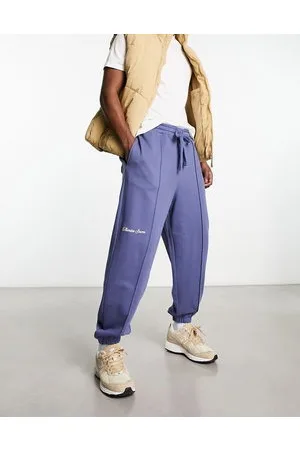 ASOS Joggers oversize con stampa stile college multipla