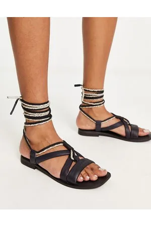 Free People Sandali avvolgenti in pelle neri e crema