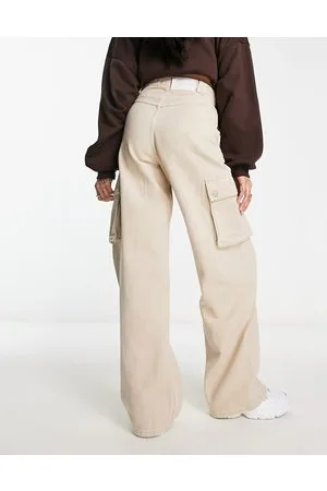 Wåven Jeans cargo a fondo ampio beige con tasche